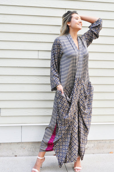 large loose caftan with big pockets deep v and printed. Long sleeve draping dress maxi upcycled and sustainable unique