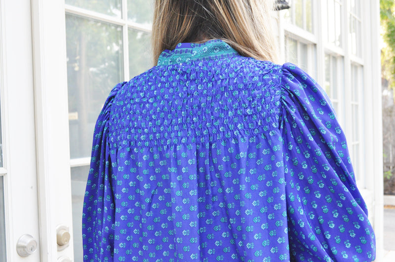 top with rouched back. smocked. printed blouse with smocking.